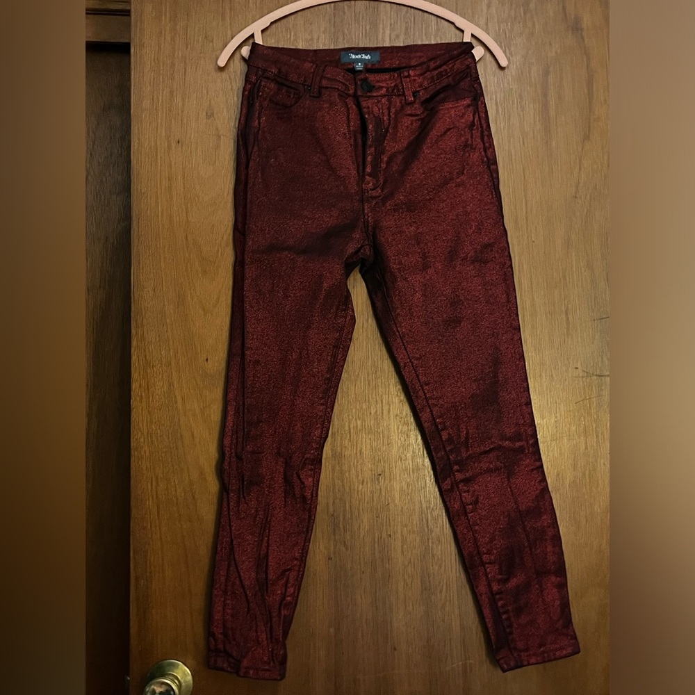 Shiny dark red jeans, perfect for the holidays.